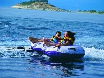 Holidaymakers taking part in water sports in the Aegean